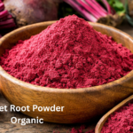 Organic beet root powder in a wooden bowl with fresh beets and beet juice on a rustic table, showcasing natural superfood ingredients rich in nutrients and antioxidants.